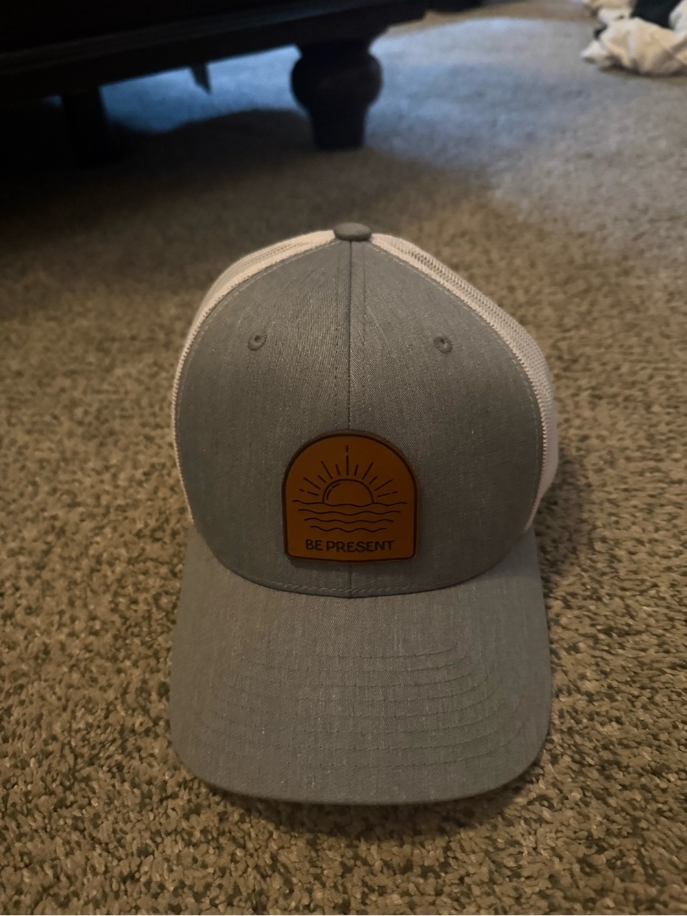 Gray and White Trucker Hat with Tan Sunrise Patch